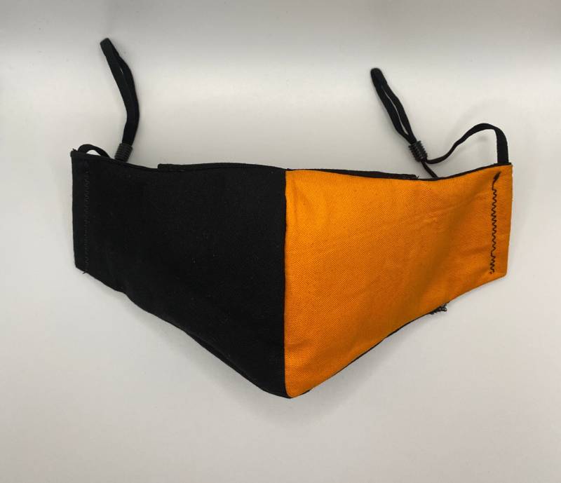 Schwarz & Orange Gesichtsmaske von AmazinGiftShop