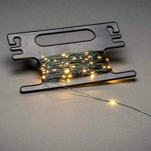 Konstsmide, 6461-830, LED Tropfenlichterkette, mit Aufroller, 300 bernsteinfarbene Dioden, 3V Außentrafo, dunkelgrüner Draht, 6461-830EE von Konstsmide