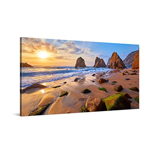 PICANOVA – Bild auf Leinwand Meeresstrand mit Felsen 100x50cm – Leinwandbild – Premium Leinwanddruck – Wandbild Kunstdruck Auf 2cm Holz-Keilrahmen Wohnzimmer Wanddekoration – Strand von PICANOVA