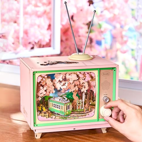 Rolife Modellbausatz Spieluhr Sakura Traumreise DIY Miniatur Haus Kit mit Kirschblüten Szene Holz Puppenhaus zur Deko für Zuhause und Bücherregal Geburtstagsgeschenk für Sie Rolife Modellbausatz Spieluhr Sakura Traumreise DIY Miniatur Haus Kit mit Kirschblüten Szene Holz Puppenhaus zur Deko für Zuhause und Bücherregal Geburtstagsgeschenk für Sie von Rolife