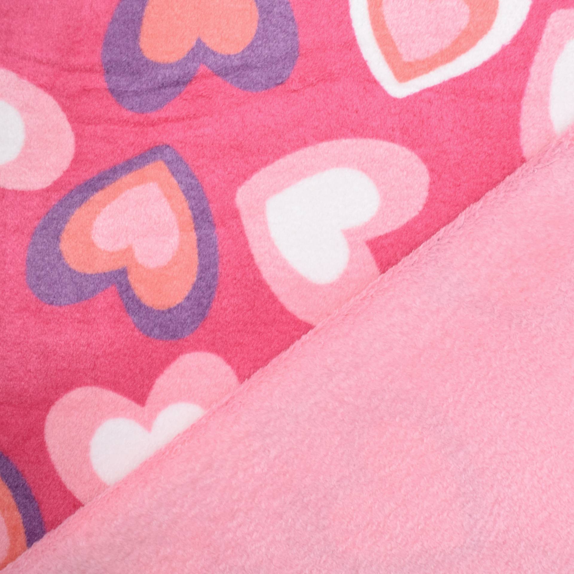 Wellnessfleece Color Hearts, pink von Stoffe Hemmers