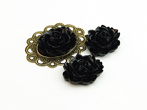 Vintageparts 4 ovale Cabochons als Blume in schwarz, 18 x 13 mm, DIY-Schmuck von Vintageparts