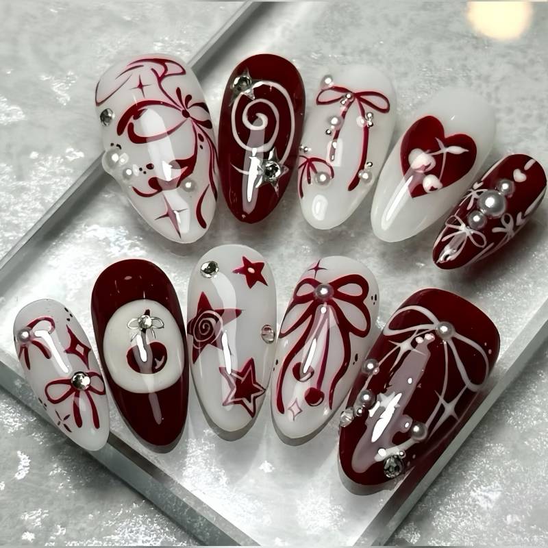 Bow-Tiful Red - Selbstgemachte 3D Press-On Nails von nailauraDE